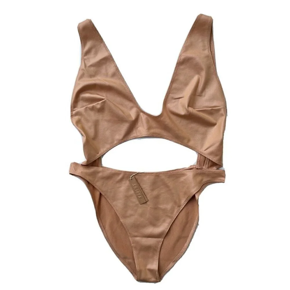 SKIMS Kim Kardashian Wet Jersey Cutout Swimsuit in Orche